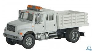 International 4900 Open Stake Bed Utility Truck White