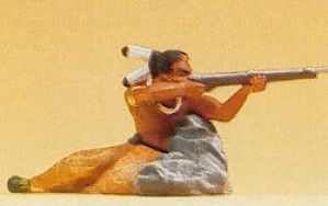 Native American Lying on Rock with Gun Figure