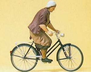 Farmer's Wife on Bicycle Figure Set